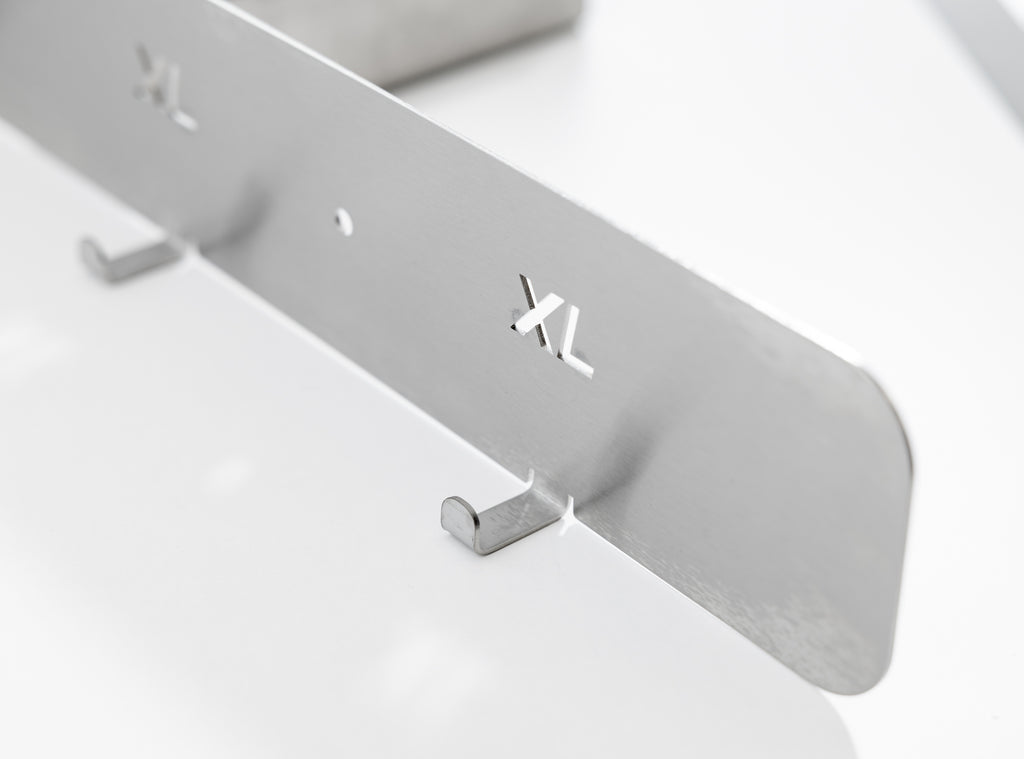 The TLC Hi Viz Holder 5 Hangers keeps high visibility vests organized, accessible, and easily identifiable in Lean workplaces. It provides a dedicated storage solution for shared PPE in factories, warehouses, workshops, and site offices. This holder helps reduce clutter, prevent loss, and supports 5S and 6S safety standards. Ideal for entrances, locker areas, and workstations.