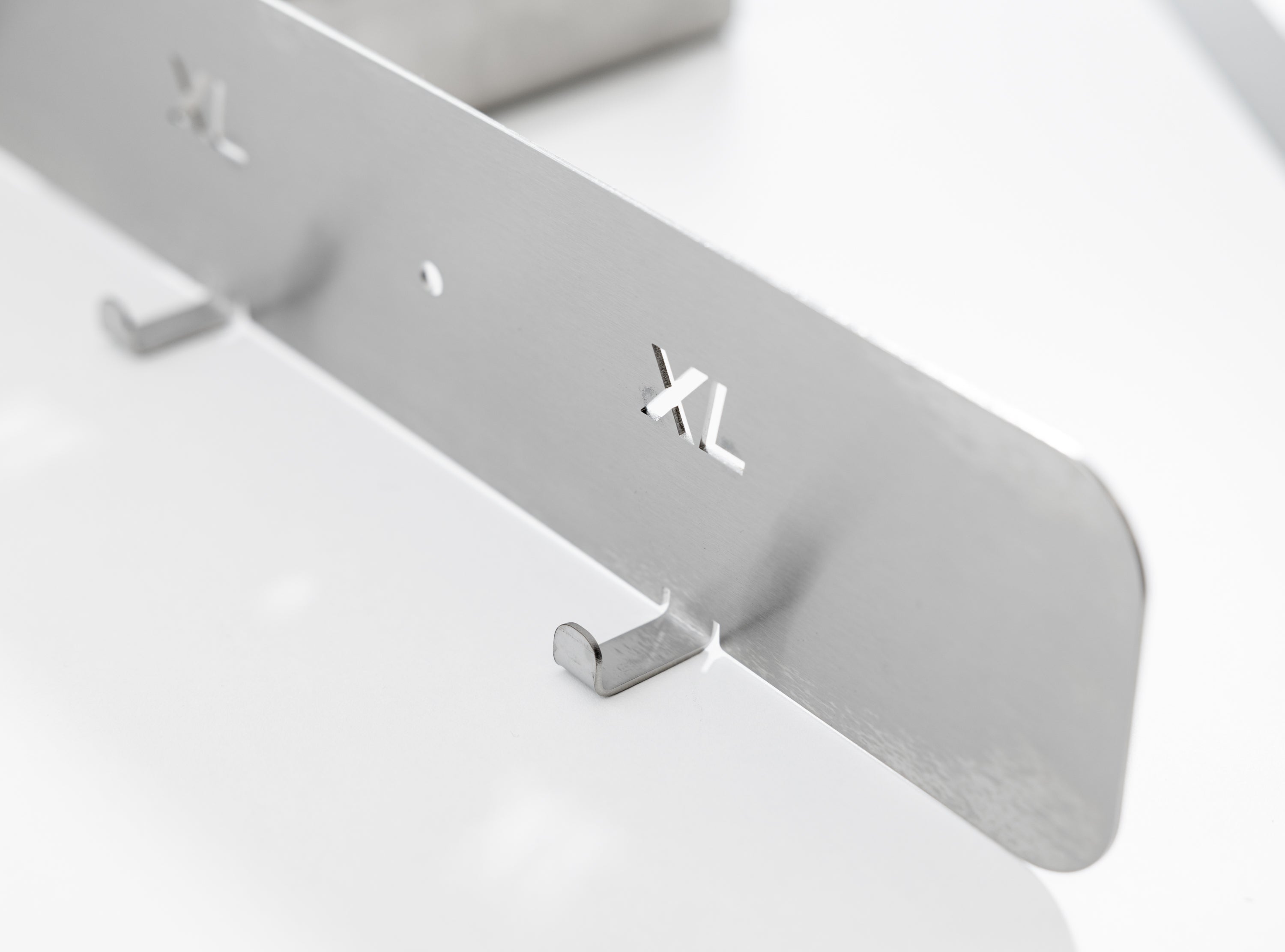 The TLC Hi Viz Holder 5 Hangers keeps high visibility vests organized, accessible, and easily identifiable in Lean workplaces. It provides a dedicated storage solution for shared PPE in factories, warehouses, workshops, and site offices. This holder helps reduce clutter, prevent loss, and supports 5S and 6S safety standards. Ideal for entrances, locker areas, and workstations.