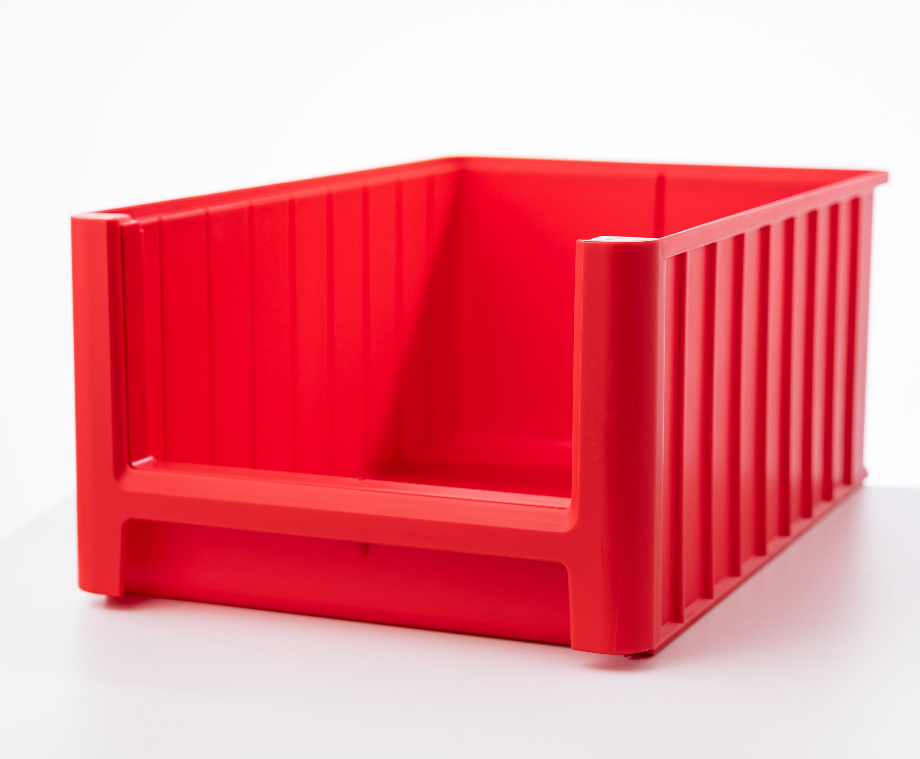 Red plastic storage bin