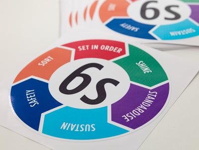 The TLC 6S Stickers reinforce the 6S methodology in Lean workplaces by adding Safety. Featuring Sort, Set in Order, Shine, Standardise, Sustain, and Safety, these durable, printed, and laminated stickers (200mm diameter) provide clear visual reminders in various environments. Suitable for walls, boards, workstations, and other smooth surfaces, they help embed safety-focused organization.