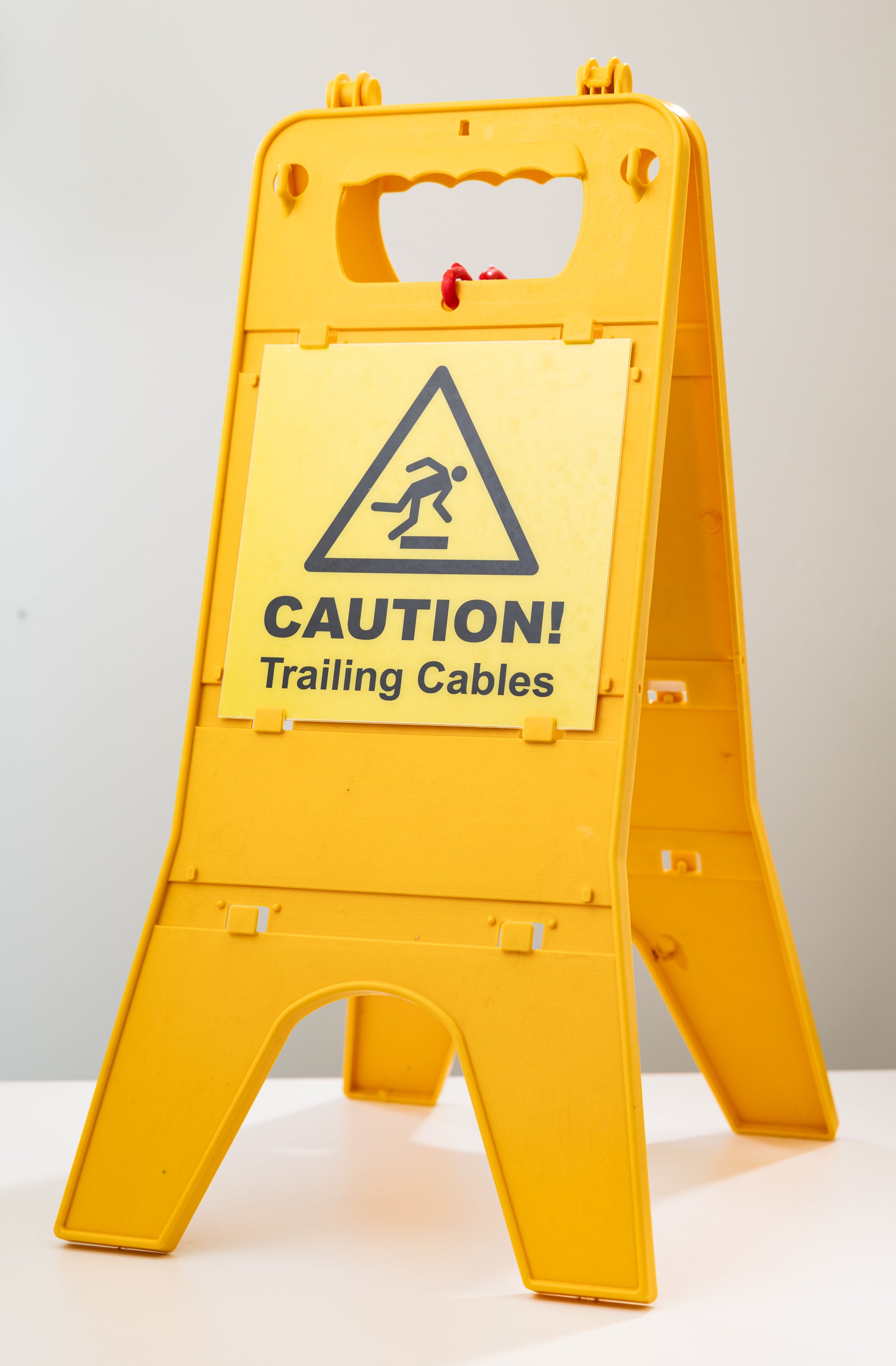 The TLC Caution Trailing Cables Standing Warning Sign improves safety in workplaces with temporary cable hazards. The bright yellow colour ensures high visibility, alerting staff and visitors. This free-standing sign is ideal for factories, warehouses, offices, and maintenance areas. It can be placed quickly and moved as needed, making it suitable for temporary work, cleaning, or maintenance activities. A simple and effective safety solution.