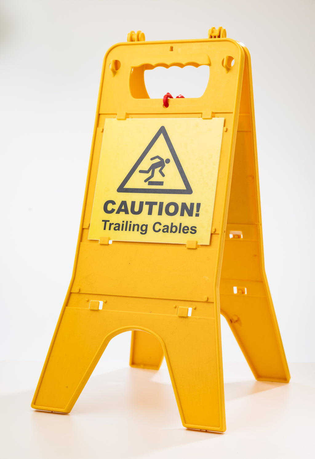 The TLC Caution Trailing Cables Standing Warning Sign improves safety in workplaces with temporary cable hazards. The bright yellow colour ensures high visibility, alerting staff and visitors. This free-standing sign is ideal for factories, warehouses, offices, and maintenance areas. It can be placed quickly and moved as needed, making it suitable for temporary work, cleaning, or maintenance activities. A simple and effective safety solution.
