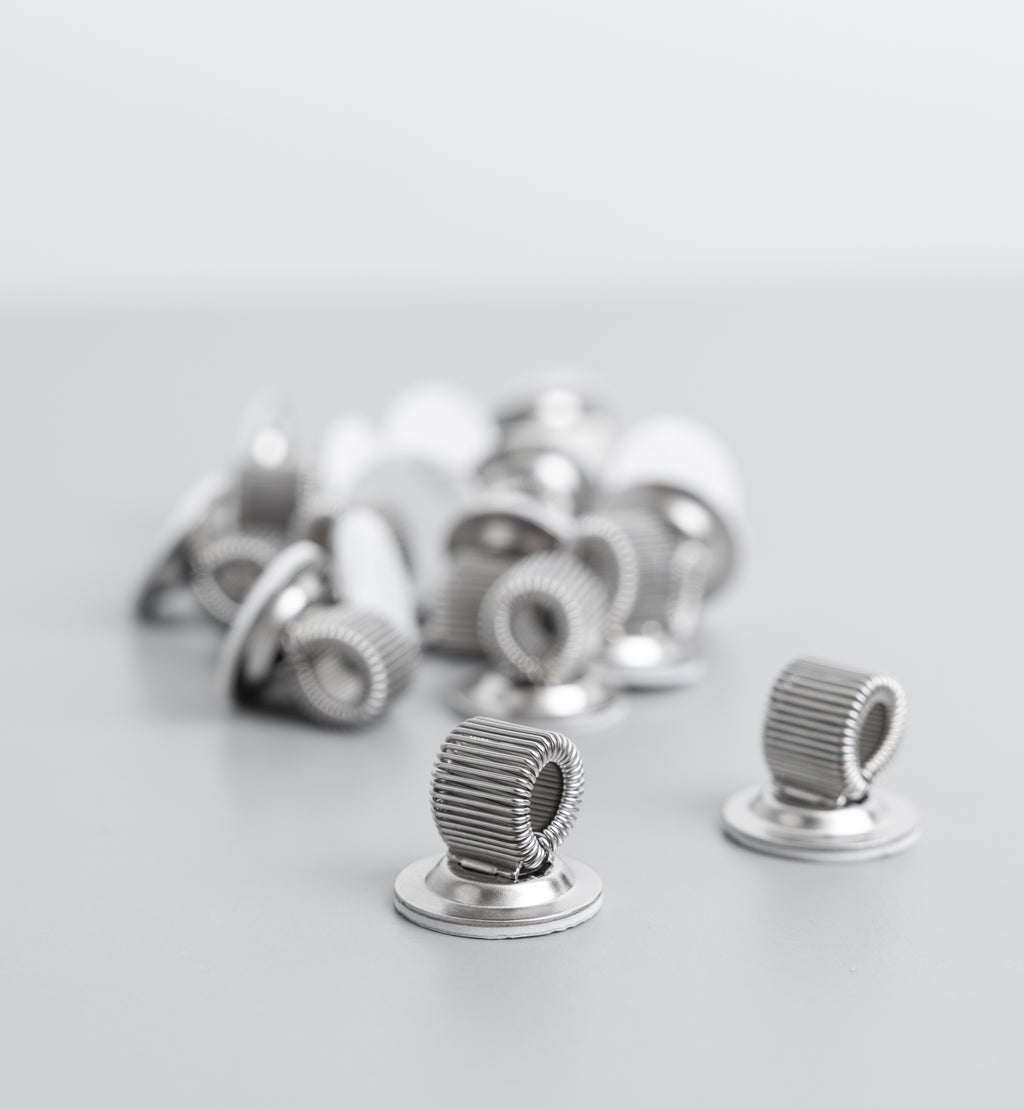 Adhesive-backed Pen Holders