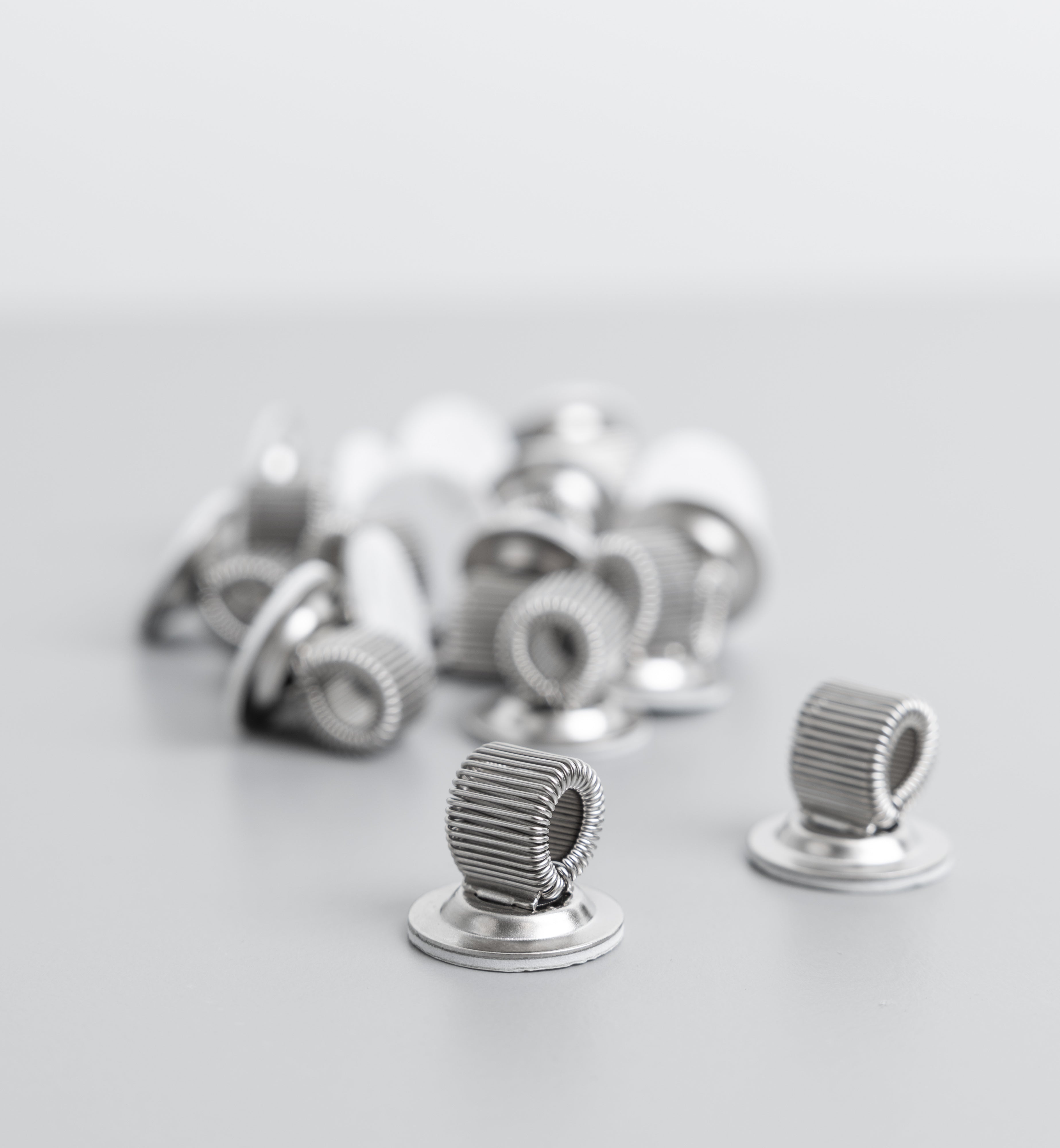 Adhesive-backed Pen Holders