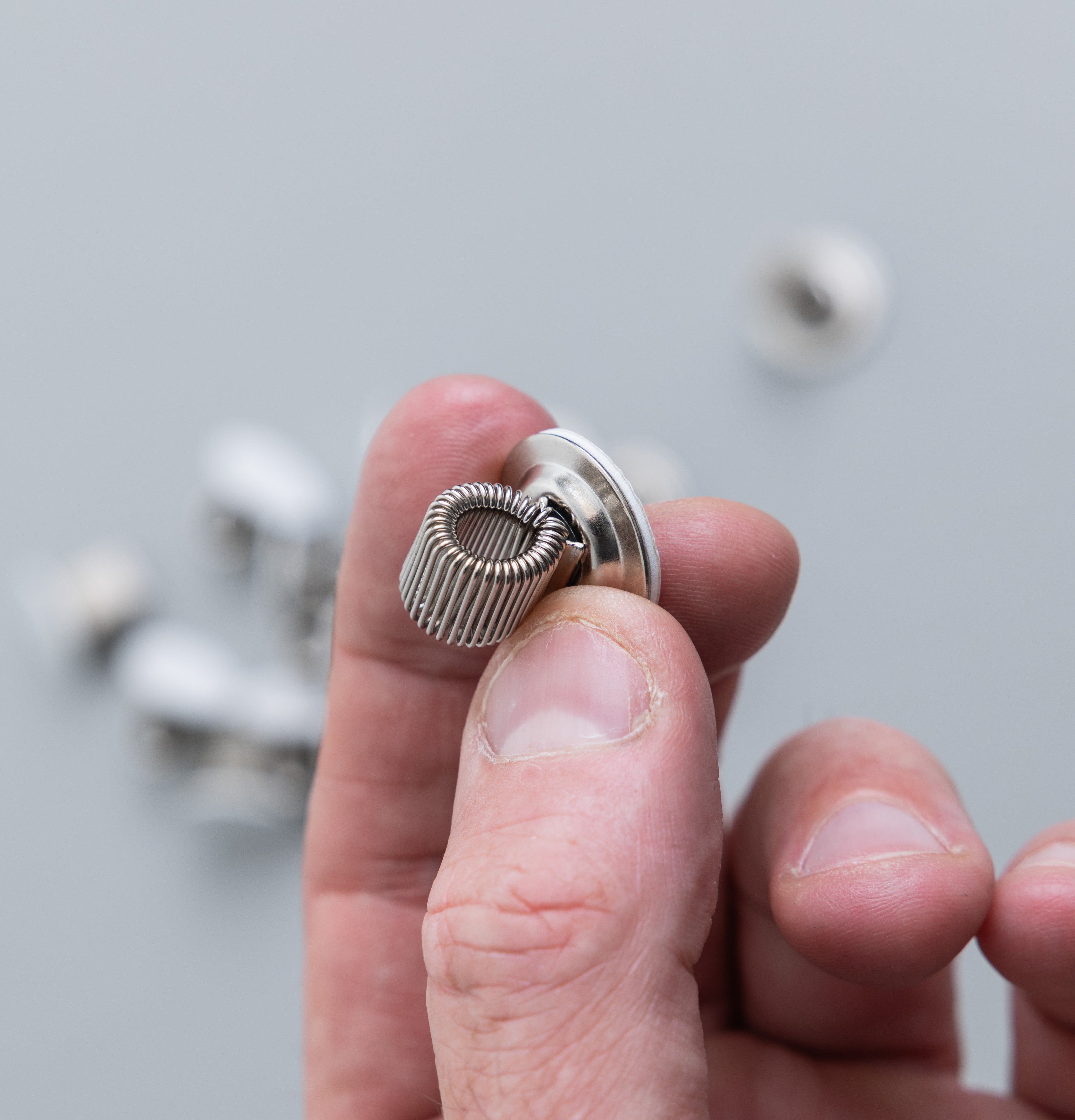 Adhesive-backed Pen Holders