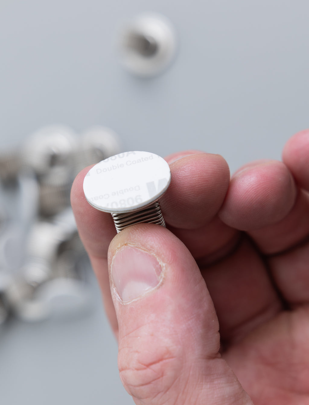 Adhesive-backed Pen Holders