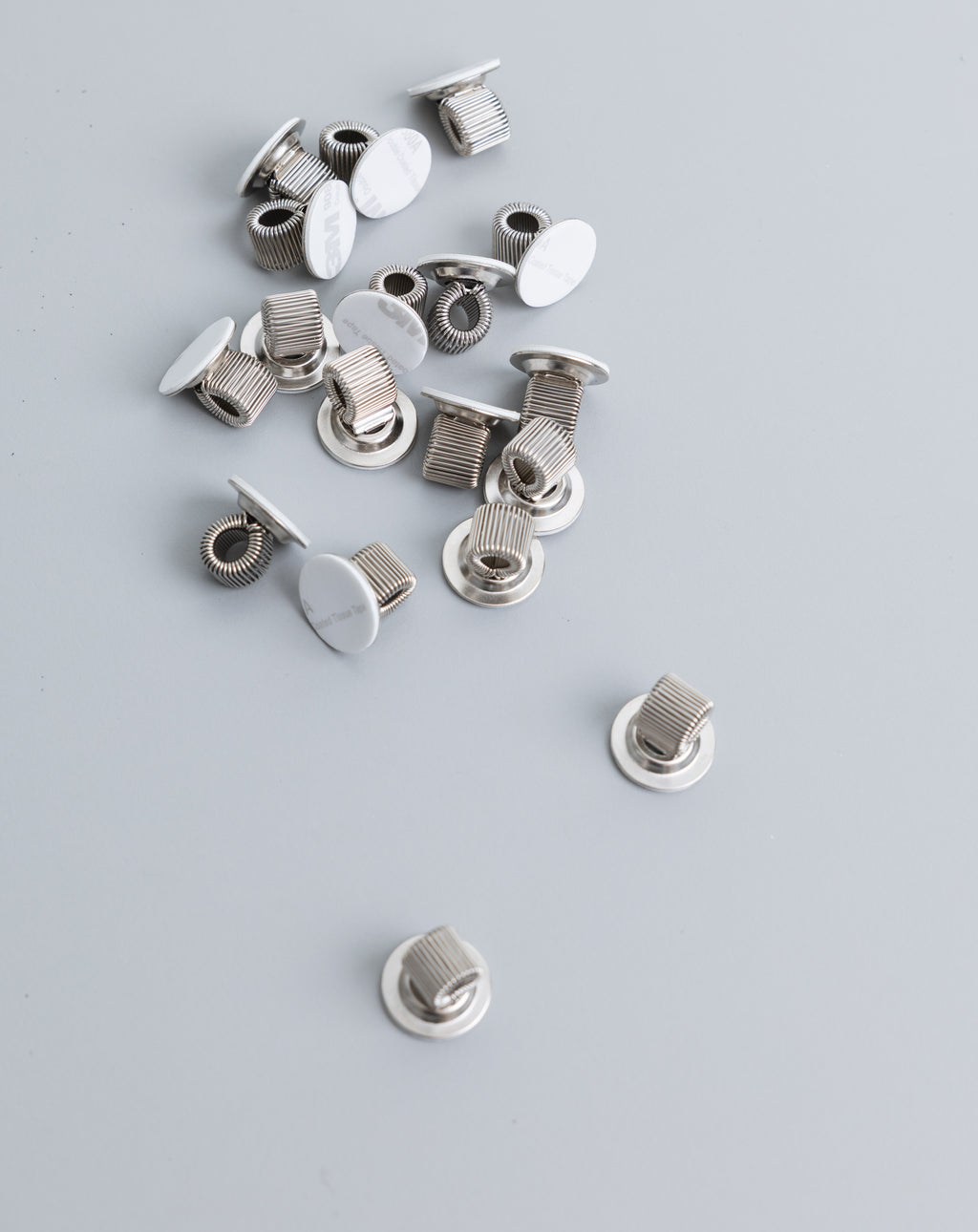 Adhesive-backed Pen Holders