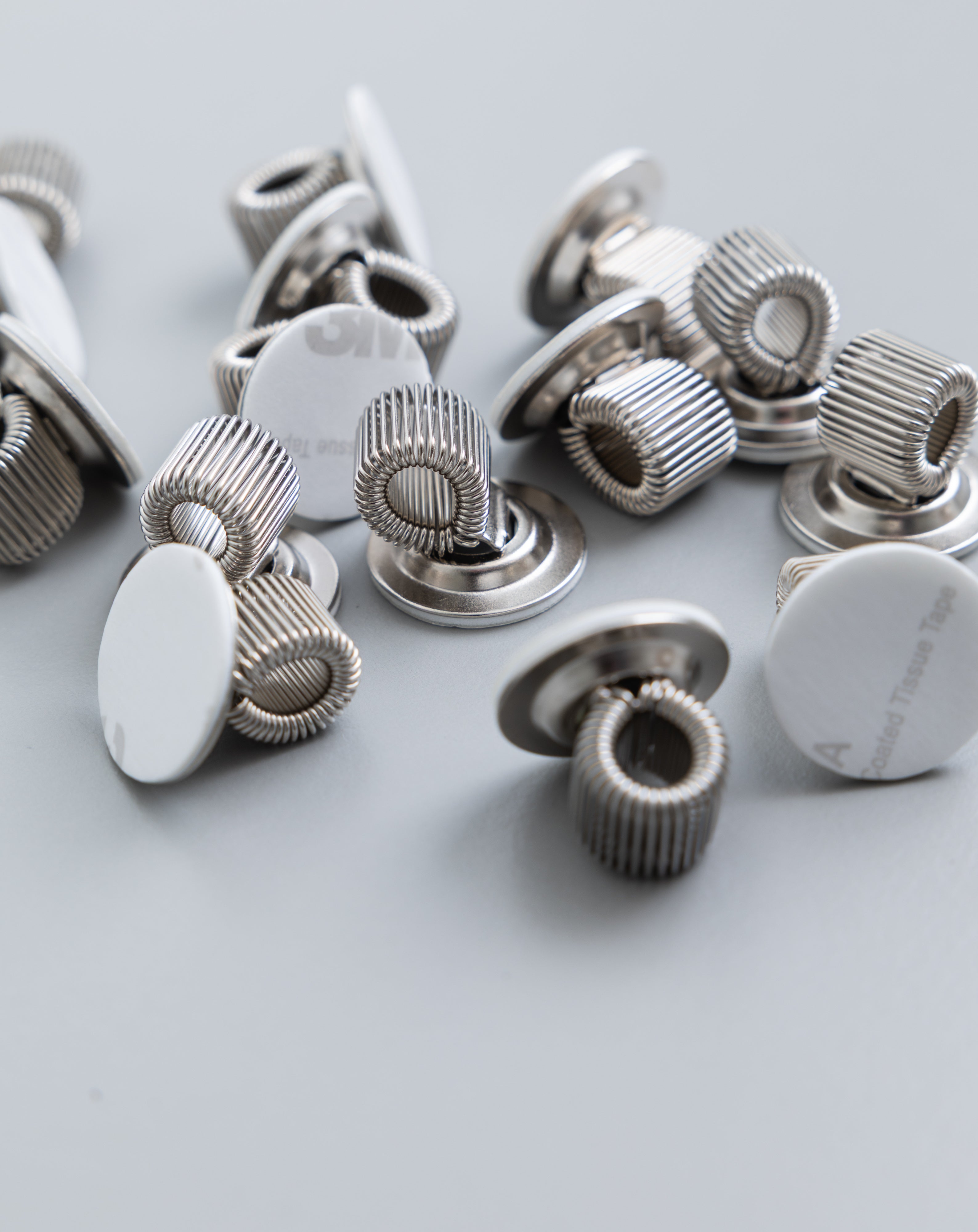 Adhesive-backed Pen Holders